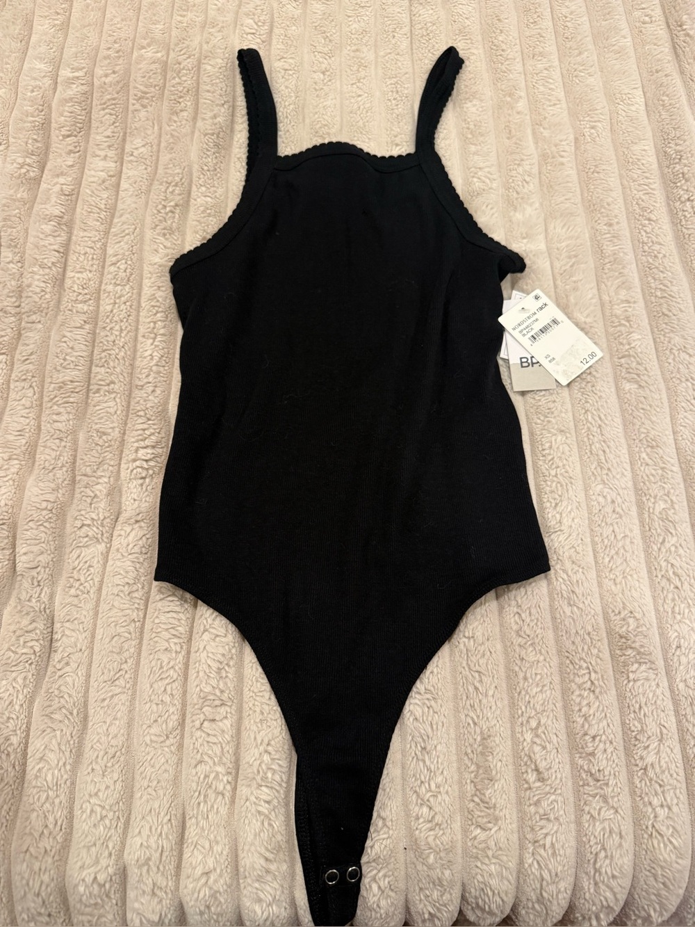 Black Ribbed One-Piece Bodysuit - Women’s